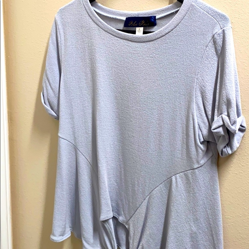 Francesca’s light sweater top